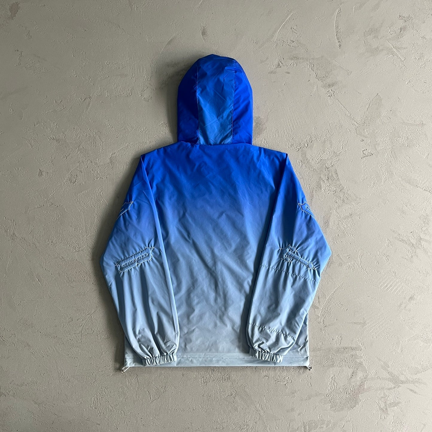 Corta Vento Trapstar "Irongate Sky Blue Gradient"